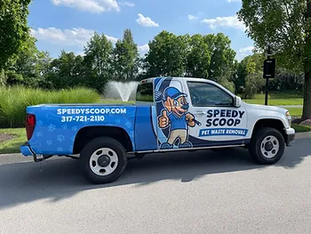 Speedy Scoop service truck parked in a suburban neighborhood, now serving Greenfield and surrounding Central Indiana areas.