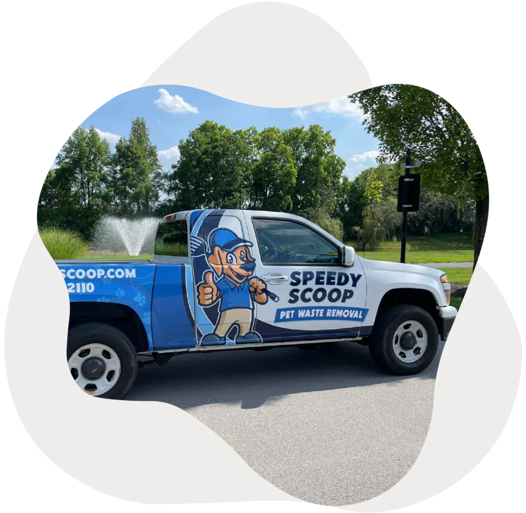 Speedy Scoop marked service truck parked in a suburban area in Central Indiana.