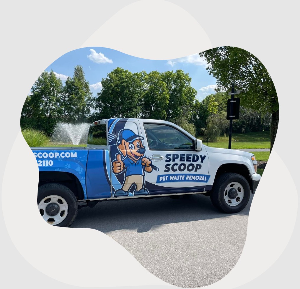 Speedy Scoop marked service truck parked in a suburban area in Central Indiana.